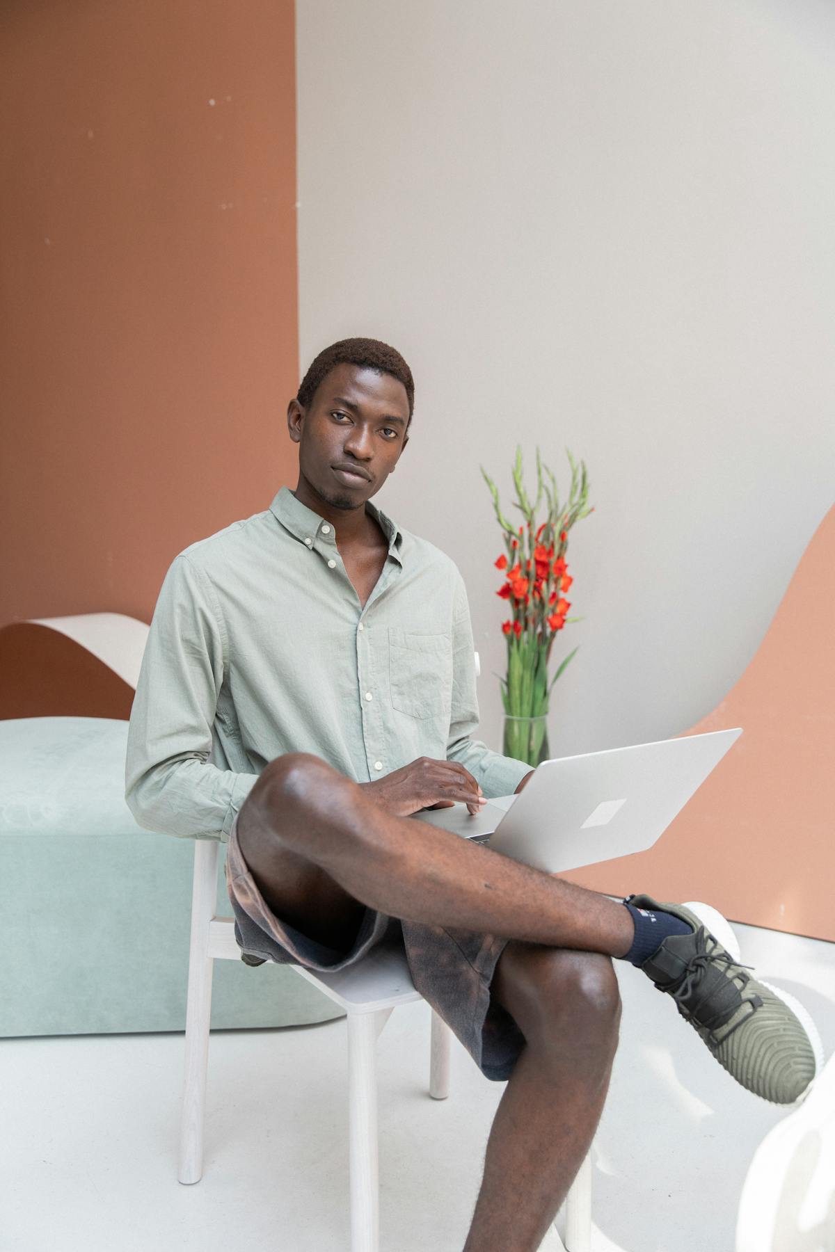 African male professional working on a laptop