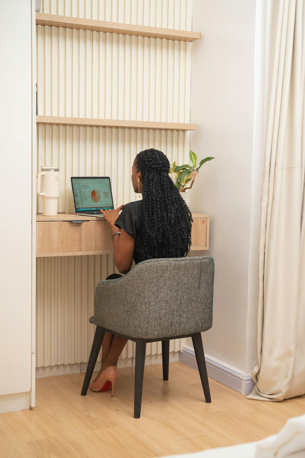 Nigerian woman working on a laptop
